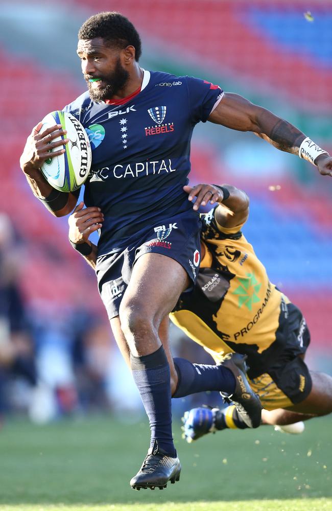 Marika Koroibete of the Rebels makes a break. Picture: Jason McCawley/Getty Images