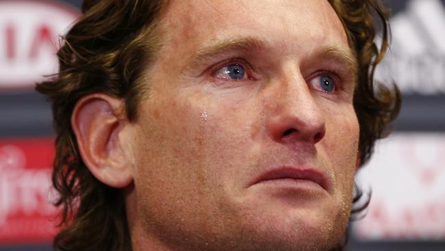 Essendon coach James Hird fronts the media today with president Paul Little and CEO Xavier Campbell and the entire playing list confirming his resignation as Essendon coach. Pic: Michael Klein