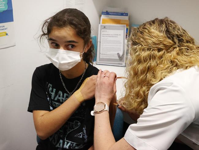 Tara Breusch, 12, receives her Moderna vaccine. The company wants to start using its Covid vaccines in children under six. Picture: Liam Kidston