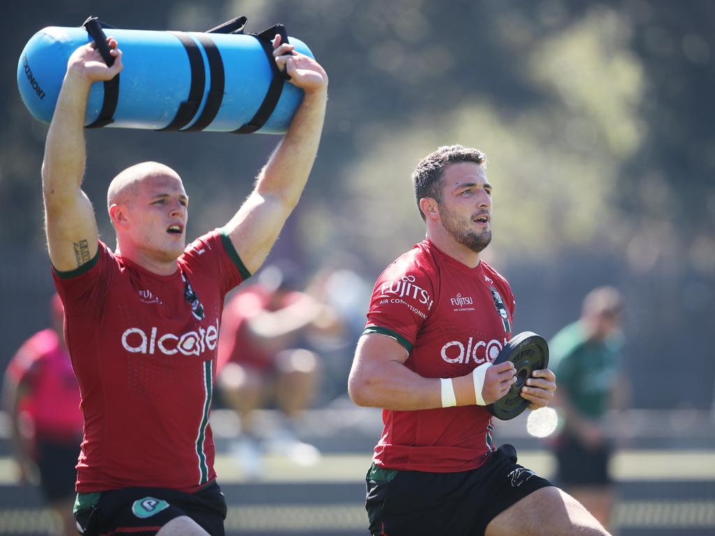 St George Illawarra halfback Drew Hutchison gets guidance from Dragons  legend Billy Smith