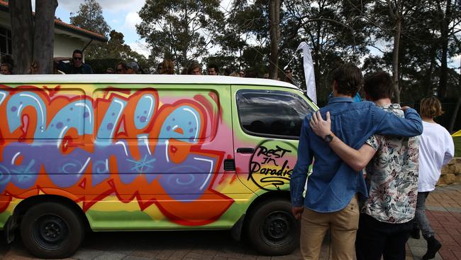 Lachlan Burleigh’s van pictured at the 17-year-old’s funeral, after it was painted on one side by his friends.