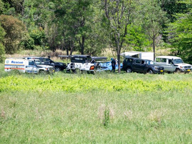 Police search for a body on a property in Upper Colo on Friday. Picture Thomas Lisson