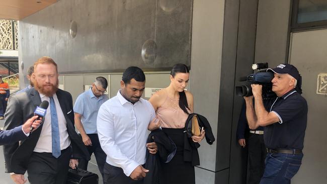 Iliesa Makita Cama (middle) and his wife Lyndal outside Newcastle District Court with lawyer Ben Hoffman (left) Picture: Amy Ziniak