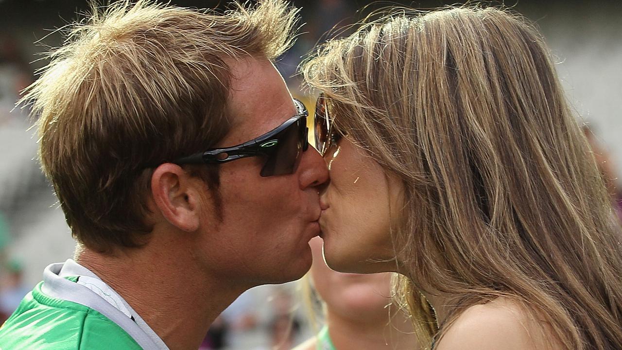 Shane Warne kisses fiancee Liz Hurley in 2011 in Melbourne, Australia. Picture: Hamish Blair/Getty Images