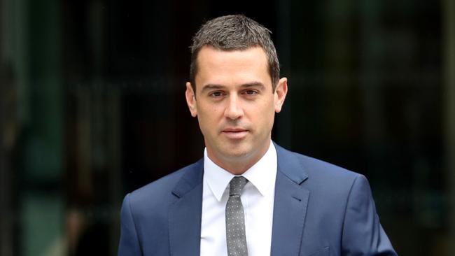 David de Garis, federal minister Michaelia Cash's former media adviser, leaves the Federal Court in Melbourne. Picture: David Geraghty