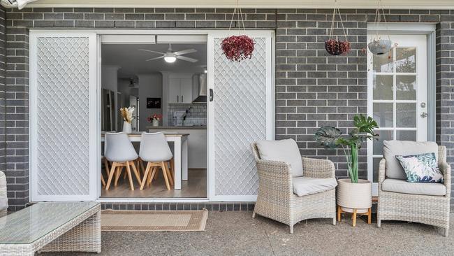 Enjoy a coffee while looking across the back yard.