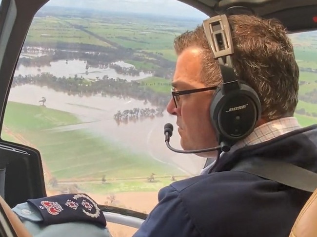 Premier Daniel Andrews flies over the flooding Campaspe river near Rochester.