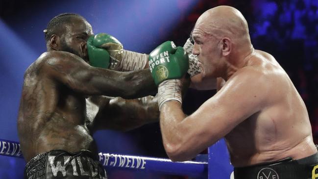 Tyson Fury lands a right on Deontay Wilder during their WBC heavyweight title fight in Las Vegas in February this year. Picture: AP