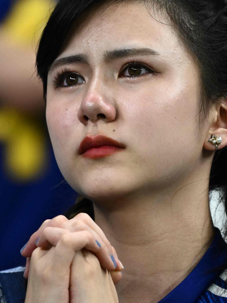 Japan supporters had a rough night. (Photo by Jewel SAMAD / AFP)