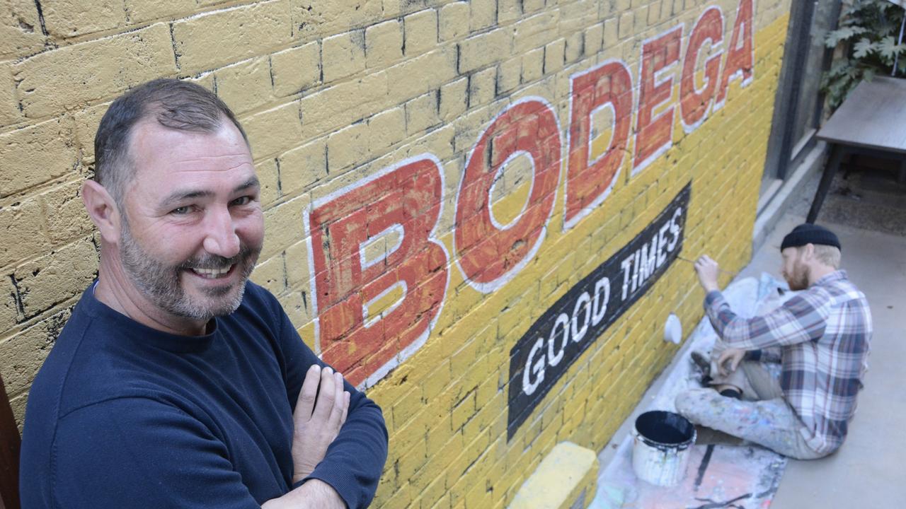 OPENING SOON: Todd Farr is getting ready to launch his new live music bar Bodega at Walton Stores, with the artwork outside the venue now completed by sign-writer Rick Hayward.