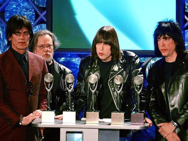 RIP ... Dee Dee Ramone with Tommy, Johnny, and Marky - members of punk music rock band The Ramones - being inducted into the Rock and Roll Hall of Fame in 2002.