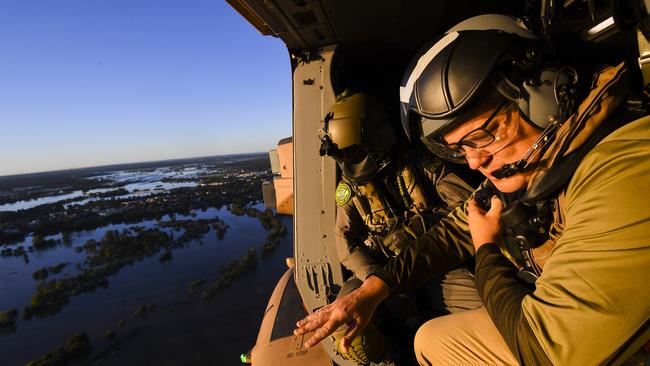 Scott Morrison inspects the damage. Picture: Getty Images