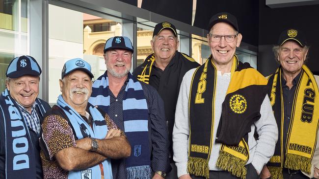 Phil 'Sandy' Nelson, Michael Graham, Robbert Klomp, Peter Carey, Neville Caldwell, and Graham Cornes in Adelaide, ahead of the SANFL grand final. Picture: Matt Loxton