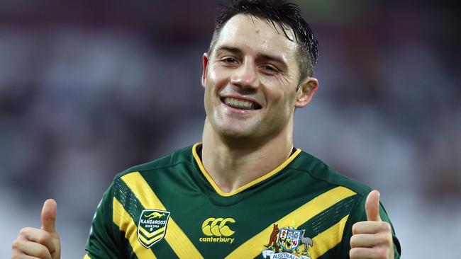 Cooper Cronk celebrates beating the Kiwis in the Four Nations final.