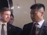 Awkward hello of Putin and Xi’s secret service breaks internet