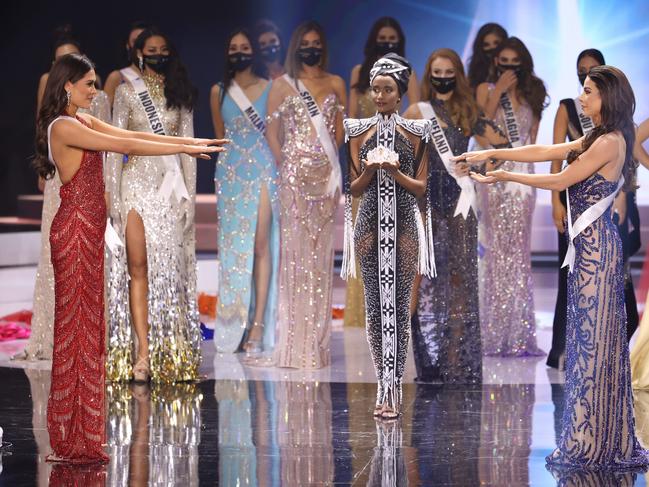 Miss Mexico Andrea Meza, Miss Universe 2019 Zozibini Tunzi and Miss Universe Brazil Julia Gama appear onstage. Picture: Getty Images