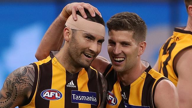 Chad Wingard and Luke Breust show what a happy team at Hawthorn looks like. Picture: Getty Images