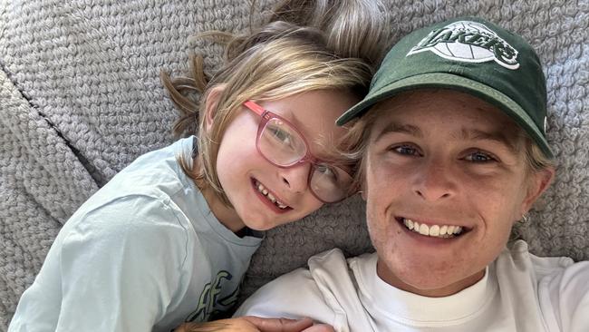 Georgia Batten, 28, who was diagnosed with thyroid cancer, with her eight year old daughter Jazmin. Picture: Supplied