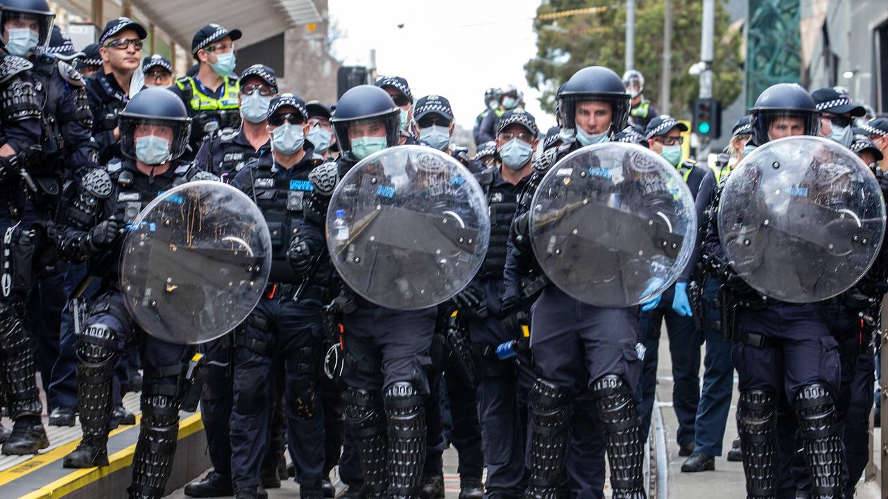 Police fending off Freedom Rally protesters in the CBD. Picture: Sarah Matray/NCA NewsWire
