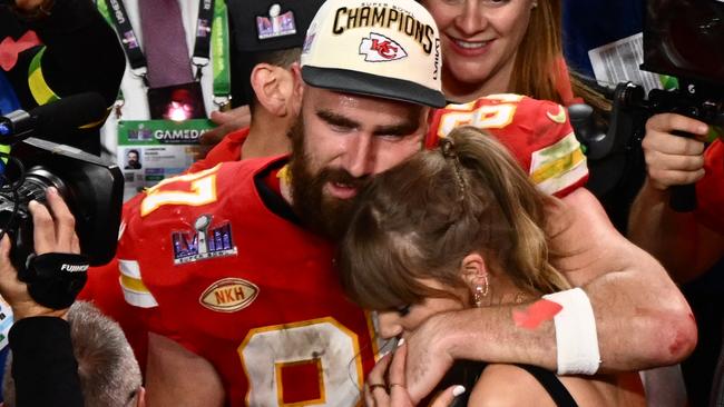 Taylor Swift and Travis Kelce embrace after the Chiefs won the Super Bowl. Picture: AFP