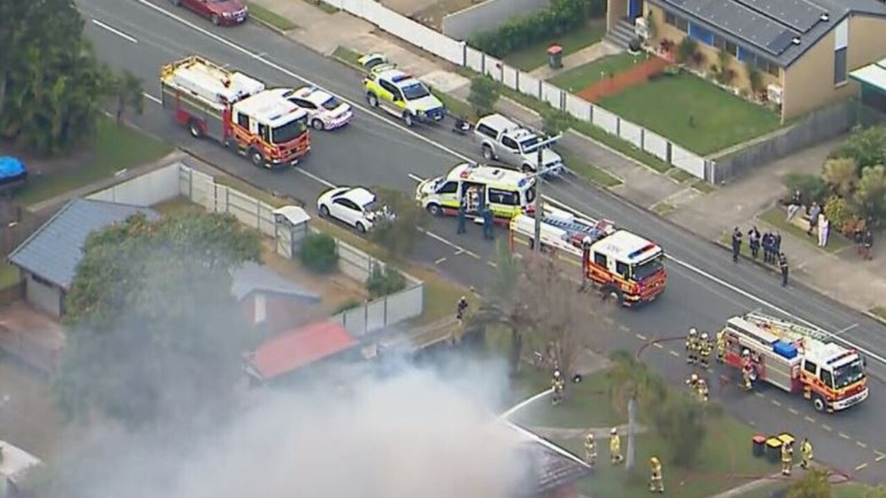 Emergency services were called to a home in Deception Bay just after 8am to the house "well and truly alight". Picture: 9 News