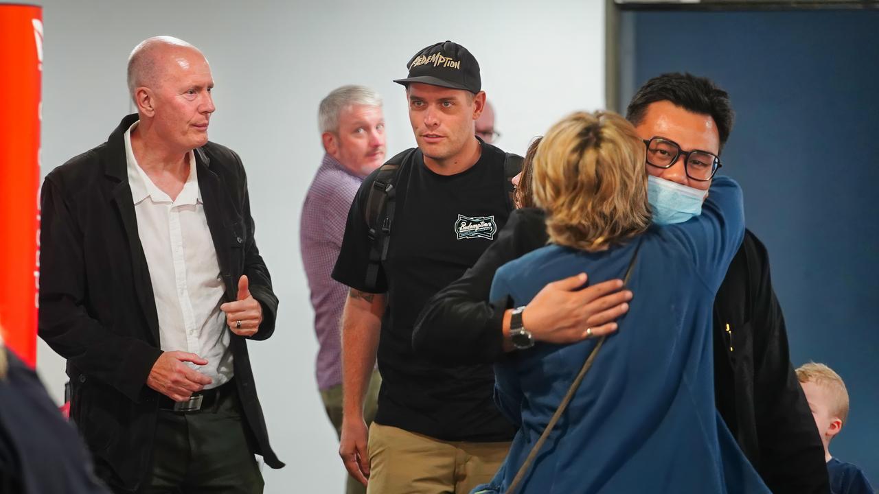 Matthew Norman and Si Yi Chen arrive in Melbourne. Photo: NewsWire/Luis Enrique Ascui