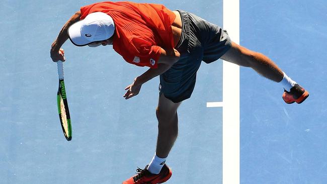 De Minaur serves during the 2019 Australian Open at Melbourne Park in January. Picture: Quinn Rooney/Getty Images