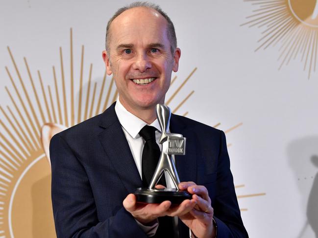 Tom Gleisner from Have You Been Paying Attention? poses for a photo with the Logie for the most outstanding entertainment program. Picture: AAP