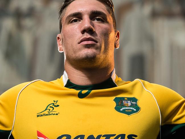 The Australian rugby union team train at the University of Notre Dame, Indiana, USA. Back rower Sean McMahon poses in front of Notre Dame's 'Word of Life' mural, better known as Touchdown Jesus.