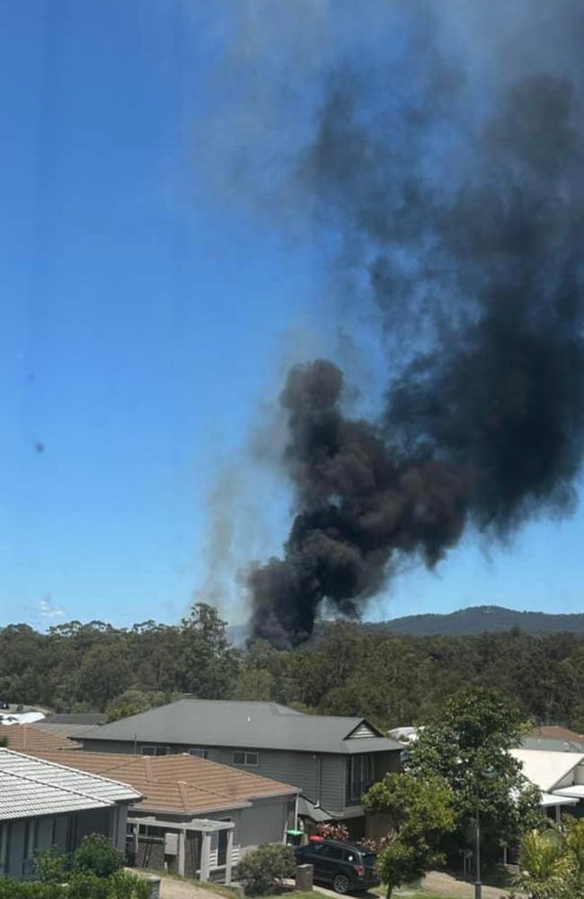 Police and fire crews were called to a fire off of the Old Pacific Hwy in Pimpama around 10.50am on Friday. Photo: Brianna Hunter/Facebook