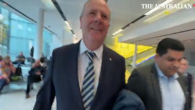 Nine chair Peter Costello has been captured on camera allegedly shoving a journalist to the ground at Canberra Airport. Picture: The Australian