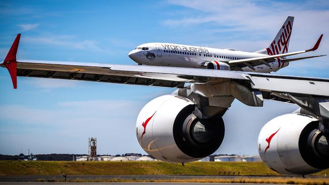 Qantas and Virgin Australia both claim to be the most punctual domestic airline.