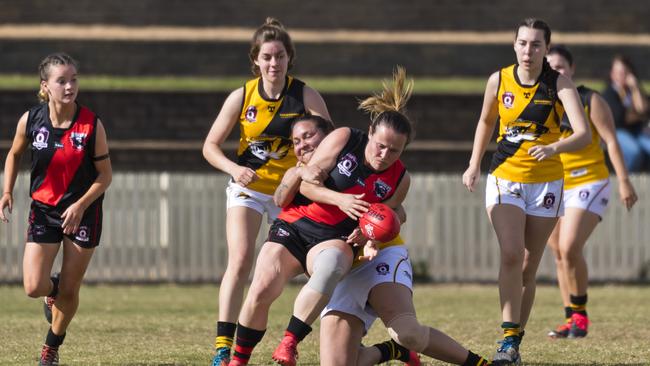 South Toowoomba Bombers player Amanda Leske tackled in the match against Toowoomba Tigers in AFL Darling Downs women round one at Rockville Oval, Saturday, July 11, 2020. Picture: Kevin Farmer