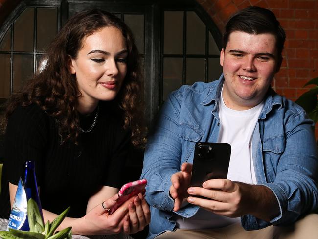 SYDNEY, AUSTRALIA : Newswire Photos AUGUST 28 2023: Patrick Blacker and Aaliyah Johnston, both 20, in Sydney with their phones. A case study on Gen Z and their phone use and why they prefer to text rather than speak on the phone. Picture: NCA Newswire/ Gaye Gerard