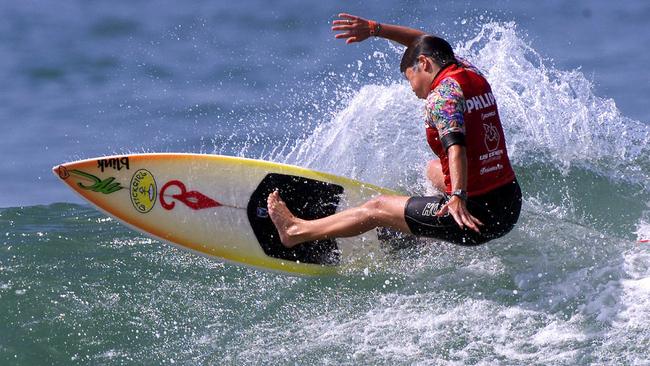 Competing in the US Open of Surfing at Huntington Beach, California in 2001. Picture: Pierre Tostee