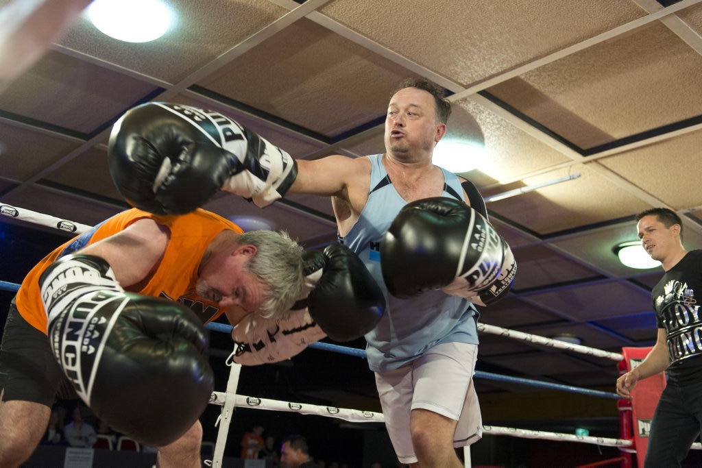 Fundraising bout participants John Geiger (left) and Nick Barker battle it out at Smithy and TGW Bring The Big Fights 14 at Rumours International, Saturday, October 22, 2016. Picture: Kevin Farmer