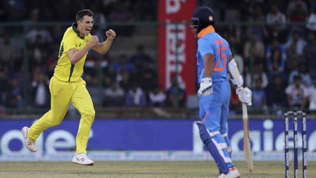 Australia's Pat Cummins celebrates the wicket of India's Shikhar Dhawan. Picture: AP