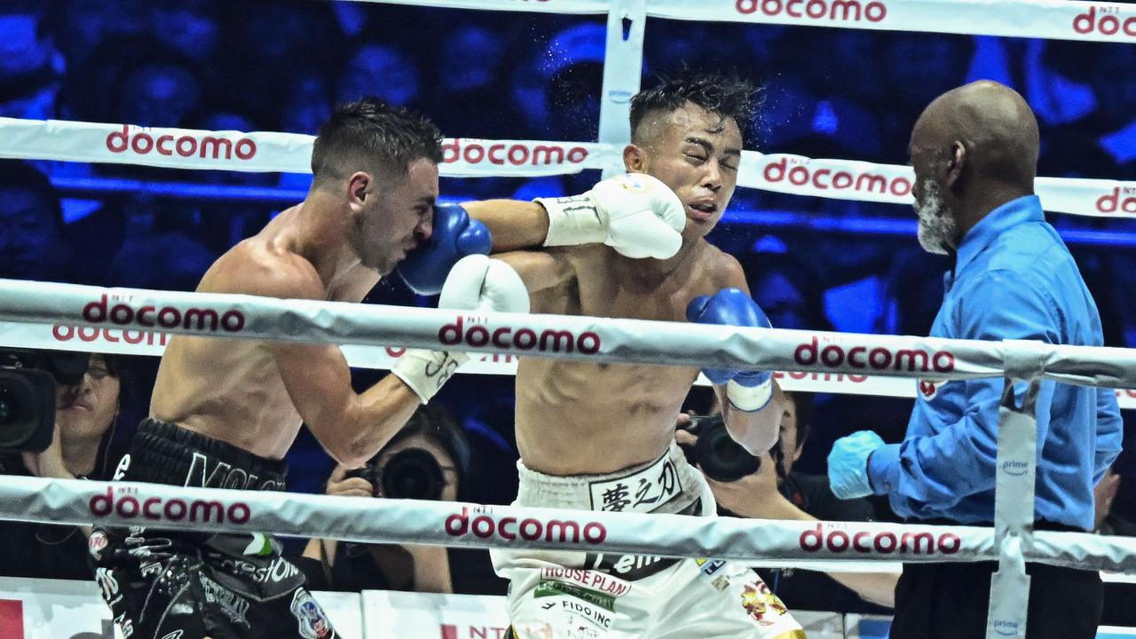 Moloney (left) lost to Japan's Yoshiki Takei in May last year. (Photo by Philip FONG/AFP)