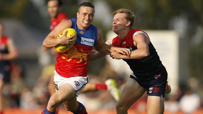 Lewis Taylor breaks away from Melbourne’s Charlie Spargo in 2019. Picture: Darrian Traynor/Getty