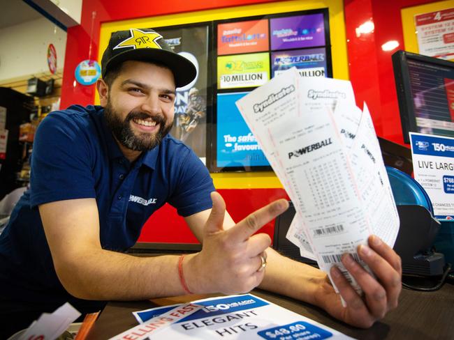 Neeraj Vic, from Southgate News and Lotto, was looking forward to the Powerball draw. Picture: Mark Stewart