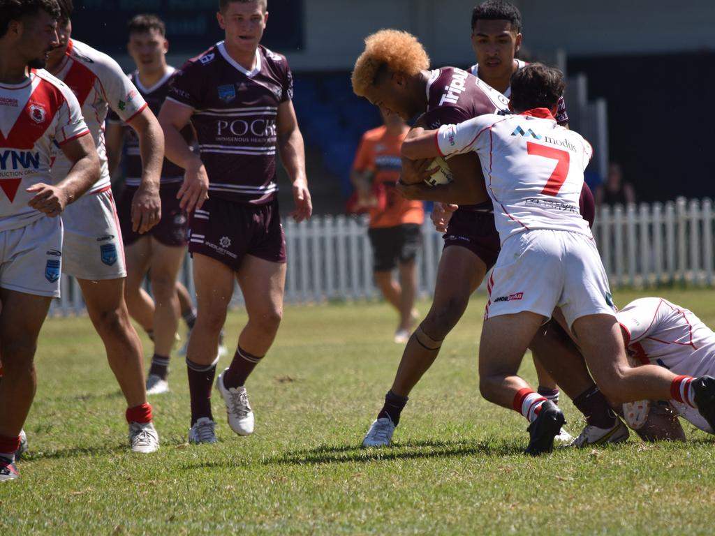 Latu Fainu is tackled by Nicholas Quinn. Picture: Sean Teuma/NewsLocal