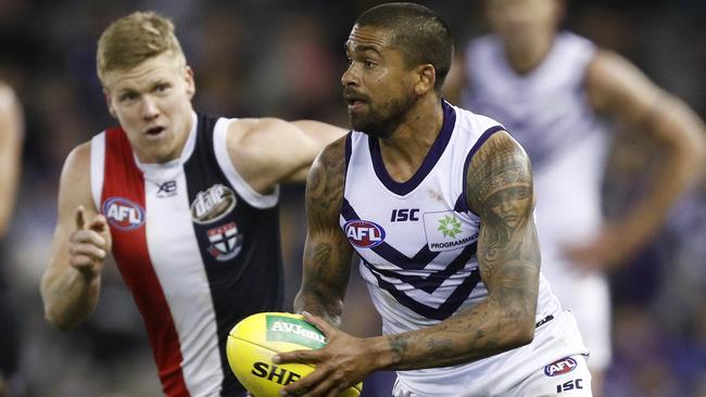 Bradley Hill gets away from Saint Dan Hannebery in 2019.