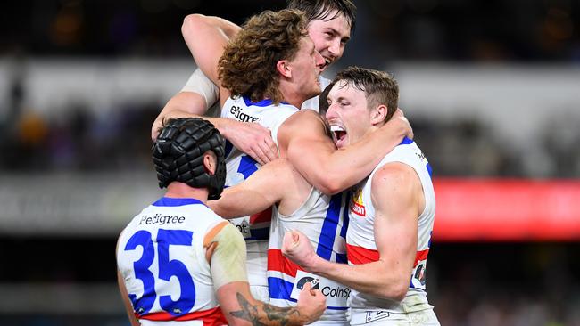 Dogs celebrate after winning a thriller in Brisbane. Picture: Getty Images