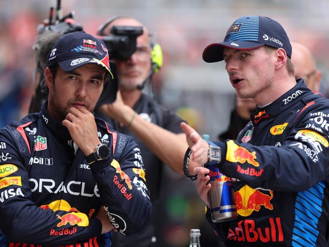 SHANGHAI, CHINA - APRIL 20: Sprint winner Max Verstappen of the Netherlands and Oracle Red Bull Racing and Third placed Sergio Perez of Mexico and Oracle Red Bull Racing look on in parc ferme during the Sprint ahead of the F1 Grand Prix of China at Shanghai International Circuit on April 20, 2024 in Shanghai, China. (Photo by Lars Baron/Getty Images)