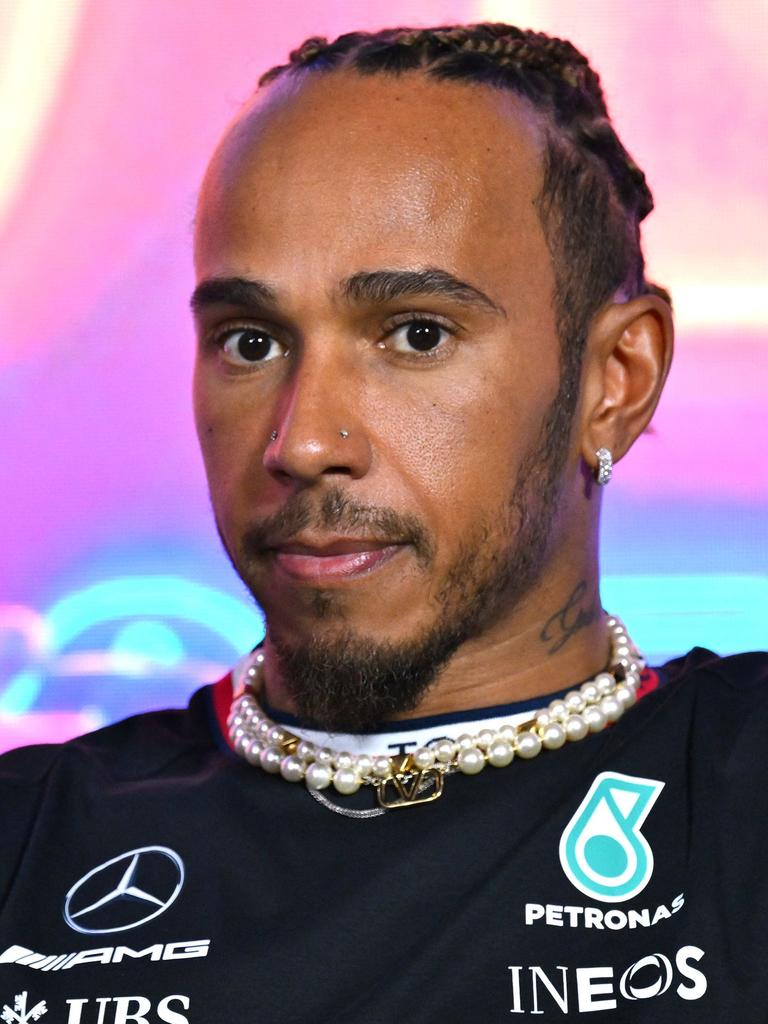 Lewis Hamilton is heading to Ferrari, not Tottenham. (Photo by ANGELA WEISS / AFP)