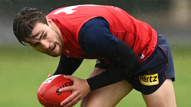 MELBOURNE, AUSTRALIA - JUNE 08: Jack Viney of the Demons gathers the ball during a Melbourne Demons AFL training session at Gosch's Paddock on June 08, 2021 in Melbourne, Australia. (Photo by Quinn Rooney/Getty Images)