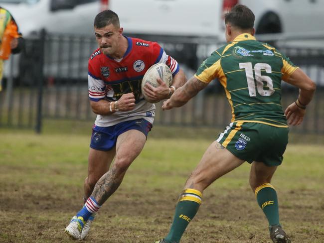 Emu Plains winger Daniel Warren takes on Dilan Curtis (No.16). Picture Warren Gannon Photography