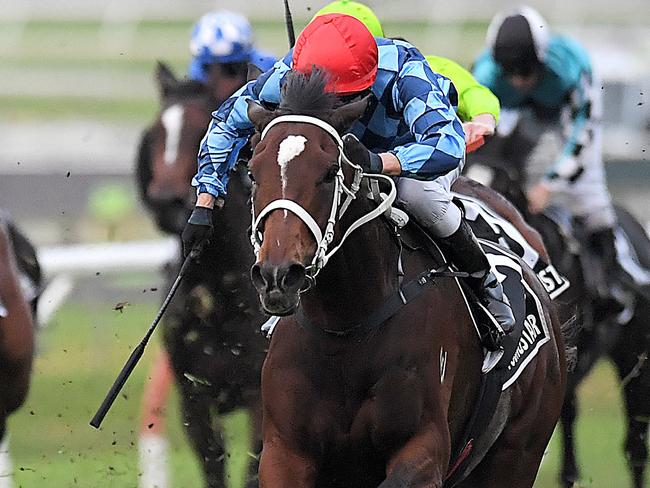 Jockey Kerrin McEvoy rides Youngstar (right) to victory in race 8, the Queensland Oaks, during the Treasury Brisbane Ladies Oaks Day at Doomben Racecourse in Brisbane, Saturday, May 26, 2018. (AAP Image/Albert Perez) NO ARCHIVING, EDITORIAL USE ONLY