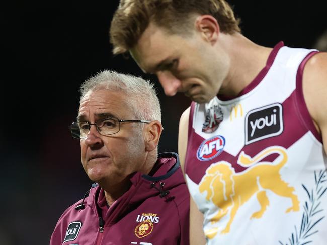 CANBERRA, AUSTRALIA - APRIL 25: Chris Fagan, Senior Coach of the Lions walk from the field after defeat during the round seven AFL match between Greater Western Sydney Giants and Brisbane Lions at Manuka Oval, on April 25, 2024, in Canberra, Australia. (Photo by Mark Metcalfe/AFL Photos/via Getty Images )