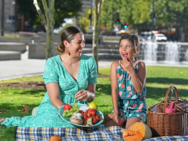 20/01/21 - Chef Emma McCaskill is among the chefs who will be hosting new, family-focussed cooking demonstrations in this year's Town Square as part of Tasting Australia.  Pictured with her daughter Grace, 7, having a picnic in Victoria Square.Picture: Tom Huntley